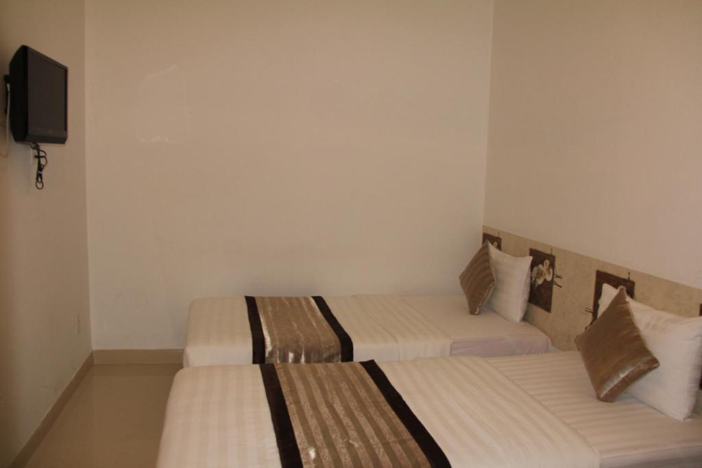 New Sunny Hotel Ho Či Minovo Město Pokoj fotografie